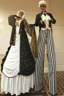 Black and white Venetian stilt walkers